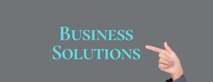 Man pointing to 'Business Solutions' for strategic growth. HiRecruitment & Training